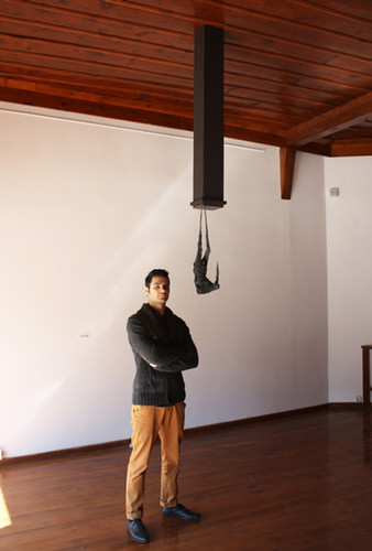 Arash Ghahari with sculpture